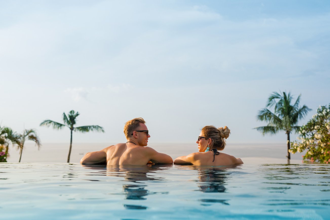 Happy Couple in Infinity Pool